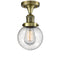 Beacon Semi-Flush Mount shown in the Antique Brass finish with a Seedy shade