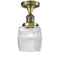 Colton Semi-Flush Mount shown in the Antique Brass finish with a Clear Halophane shade