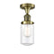 Dover Semi-Flush Mount shown in the Antique Brass finish with a Clear shade