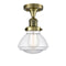 Olean Semi-Flush Mount shown in the Antique Brass finish with a Clear shade