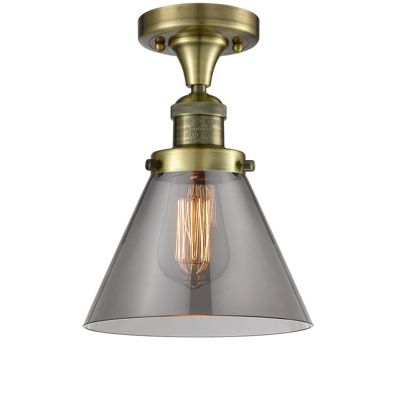 Cone Semi-Flush Mount shown in the Antique Brass finish with a Plated Smoke shade