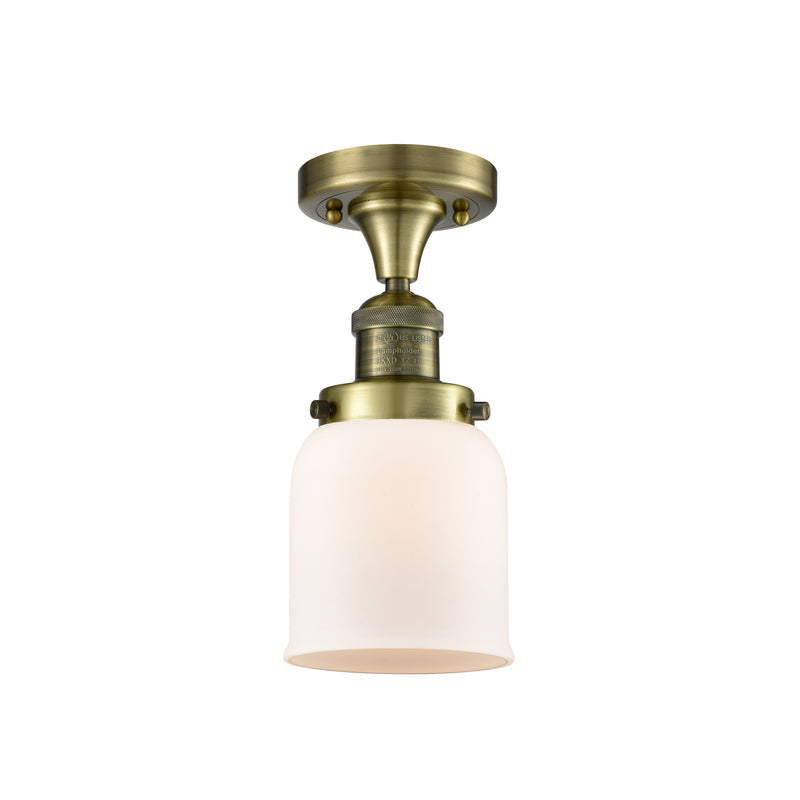 Bell Semi-Flush Mount shown in the Antique Brass finish with a Matte White shade