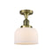 Bell Semi-Flush Mount shown in the Antique Brass finish with a Matte White shade