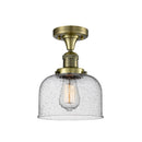 Bell Semi-Flush Mount shown in the Antique Brass finish with a Seedy shade