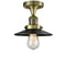 Railroad Semi-Flush Mount shown in the Antique Brass finish with a Matte Black shade