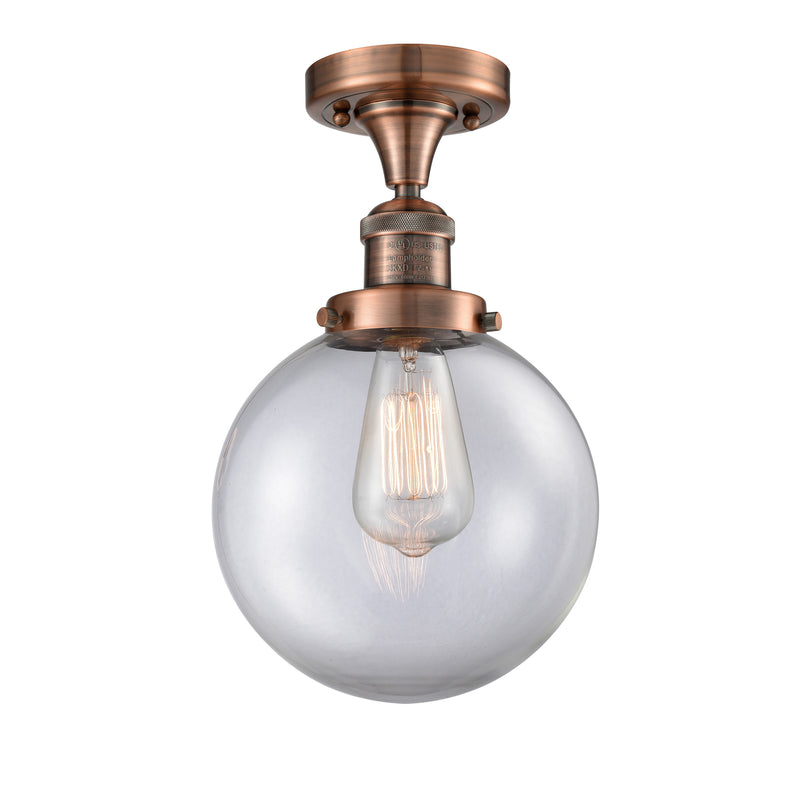 Beacon Semi-Flush Mount shown in the Antique Copper finish with a Clear shade