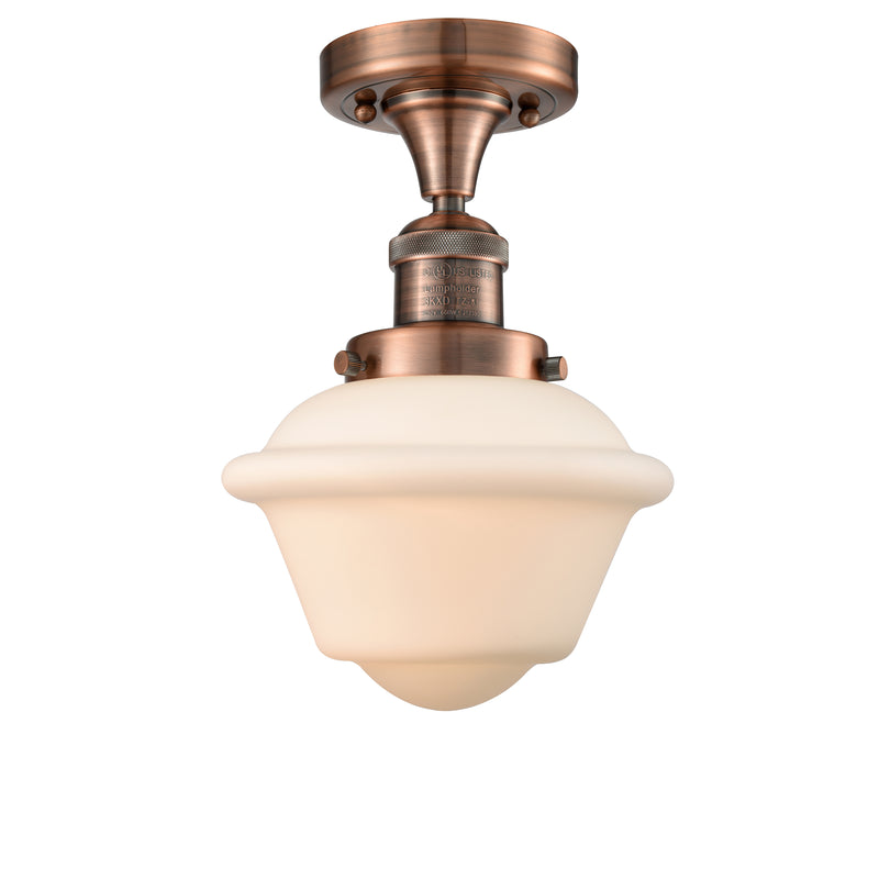 Oxford Semi-Flush Mount shown in the Antique Copper finish with a Matte White shade