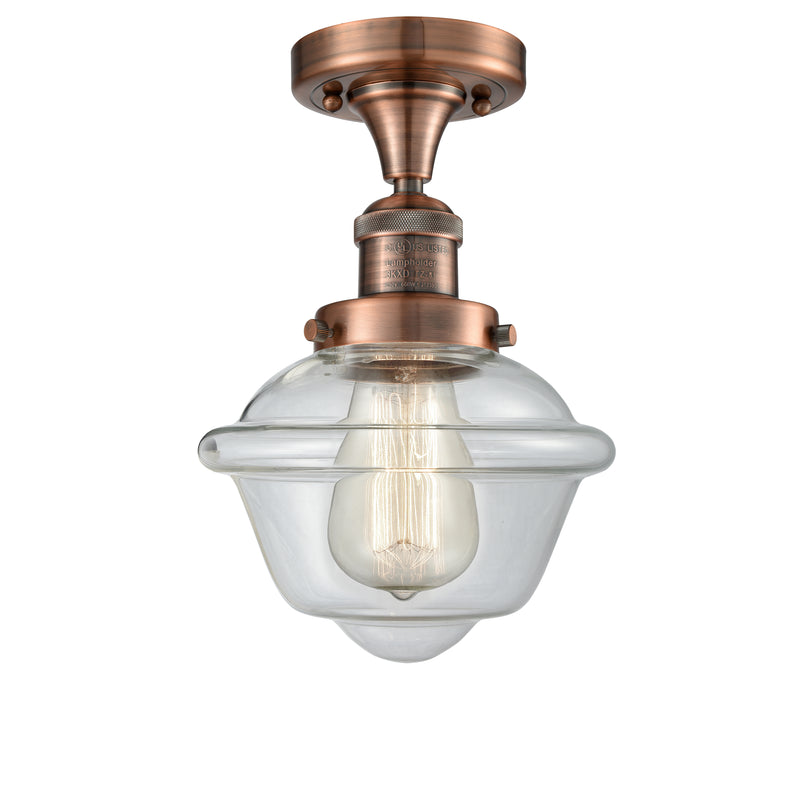 Oxford Semi-Flush Mount shown in the Antique Copper finish with a Clear shade