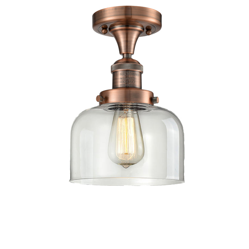 Bell Semi-Flush Mount shown in the Antique Copper finish with a Clear shade