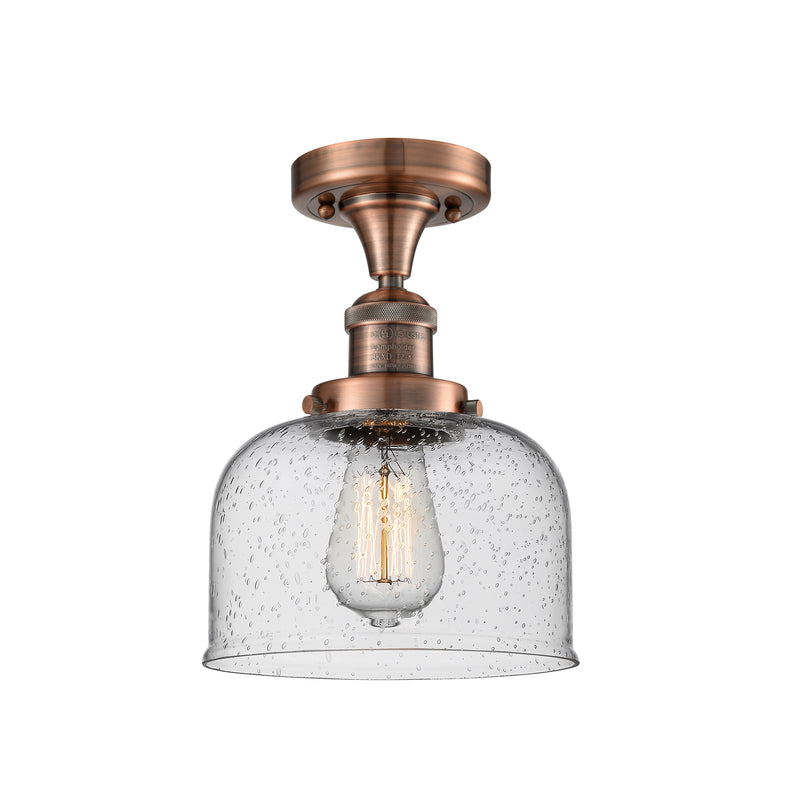 Bell Semi-Flush Mount shown in the Antique Copper finish with a Seedy shade