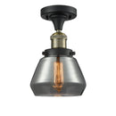 Fulton Semi-Flush Mount shown in the Black Antique Brass finish with a Plated Smoke shade