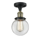 Beacon Semi-Flush Mount shown in the Black Antique Brass finish with a Clear shade