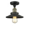 Railroad Semi-Flush Mount shown in the Black Antique Brass finish with a Matte Black shade