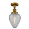 Geneseo Semi-Flush Mount shown in the Brushed Brass finish with a Clear Crackled shade