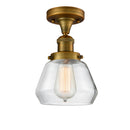 Fulton Semi-Flush Mount shown in the Brushed Brass finish with a Clear shade