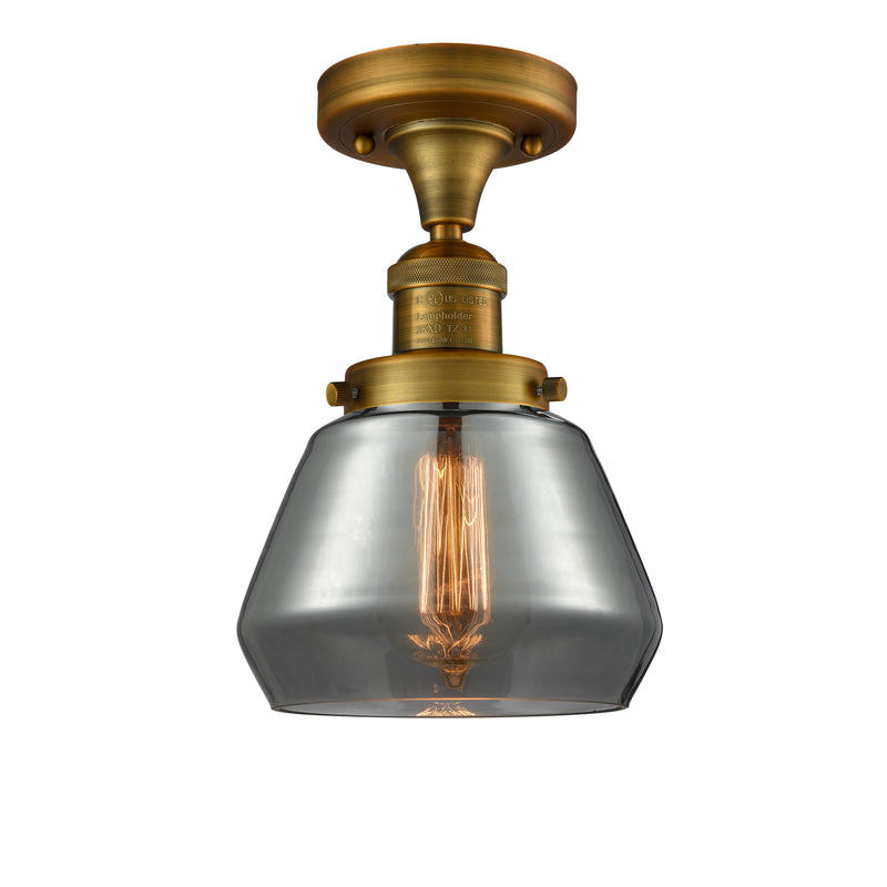 Fulton Semi-Flush Mount shown in the Brushed Brass finish with a Plated Smoke shade