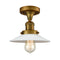 Halophane Semi-Flush Mount shown in the Brushed Brass finish with a Matte White Halophane shade