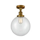 Beacon Semi-Flush Mount shown in the Brushed Brass finish with a Clear shade