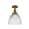 Seneca Falls Semi-Flush Mount shown in the Brushed Brass finish with a Clear Halophane shade