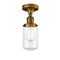 Dover Semi-Flush Mount shown in the Brushed Brass finish with a Clear shade