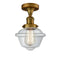 Oxford Semi-Flush Mount shown in the Brushed Brass finish with a Clear shade