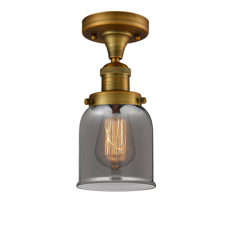 Bell Semi-Flush Mount shown in the Brushed Brass finish with a Plated Smoke shade