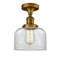 Bell Semi-Flush Mount shown in the Brushed Brass finish with a Clear shade