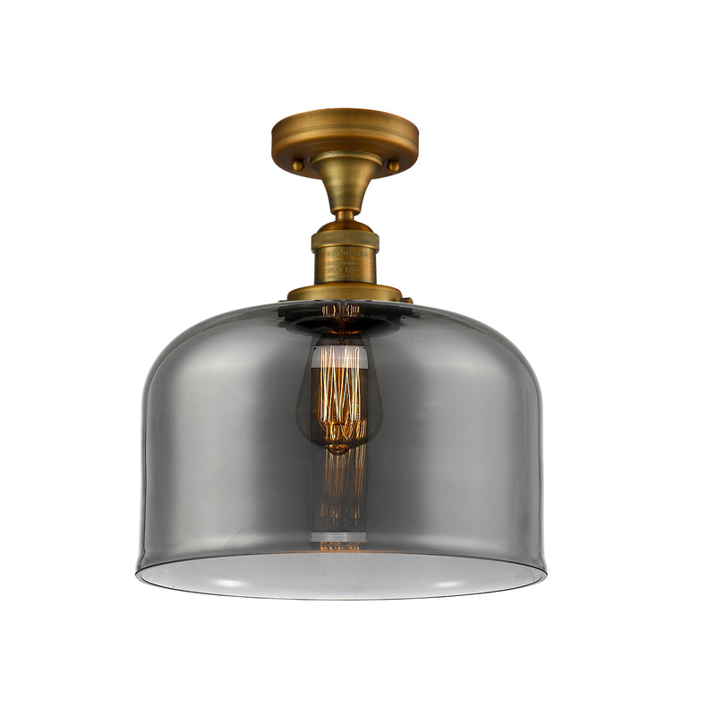 Bell Semi-Flush Mount shown in the Brushed Brass finish with a Plated Smoke shade