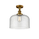 Bell Semi-Flush Mount shown in the Brushed Brass finish with a Seedy shade