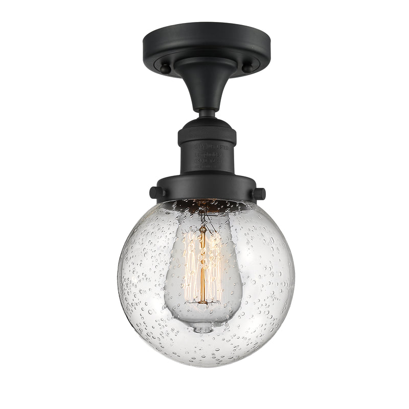 Beacon Semi-Flush Mount shown in the Matte Black finish with a Seedy shade