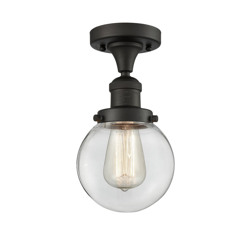 Beacon Semi-Flush Mount shown in the Oil Rubbed Bronze finish with a Clear shade