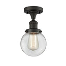 Beacon Semi-Flush Mount shown in the Oil Rubbed Bronze finish with a Clear shade