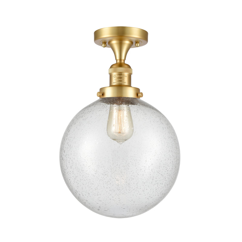 Beacon Semi-Flush Mount shown in the Satin Gold finish with a Seedy shade