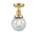 Beacon Semi-Flush Mount shown in the Satin Gold finish with a Seedy shade