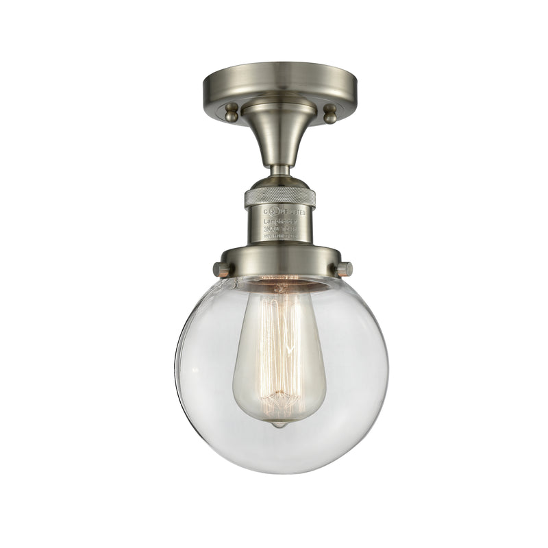 Beacon Semi-Flush Mount shown in the Brushed Satin Nickel finish with a Clear shade