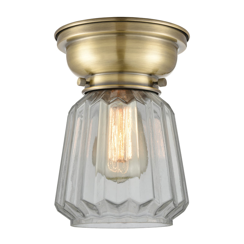 Chatham Flush Mount shown in the Antique Brass finish with a Clear shade