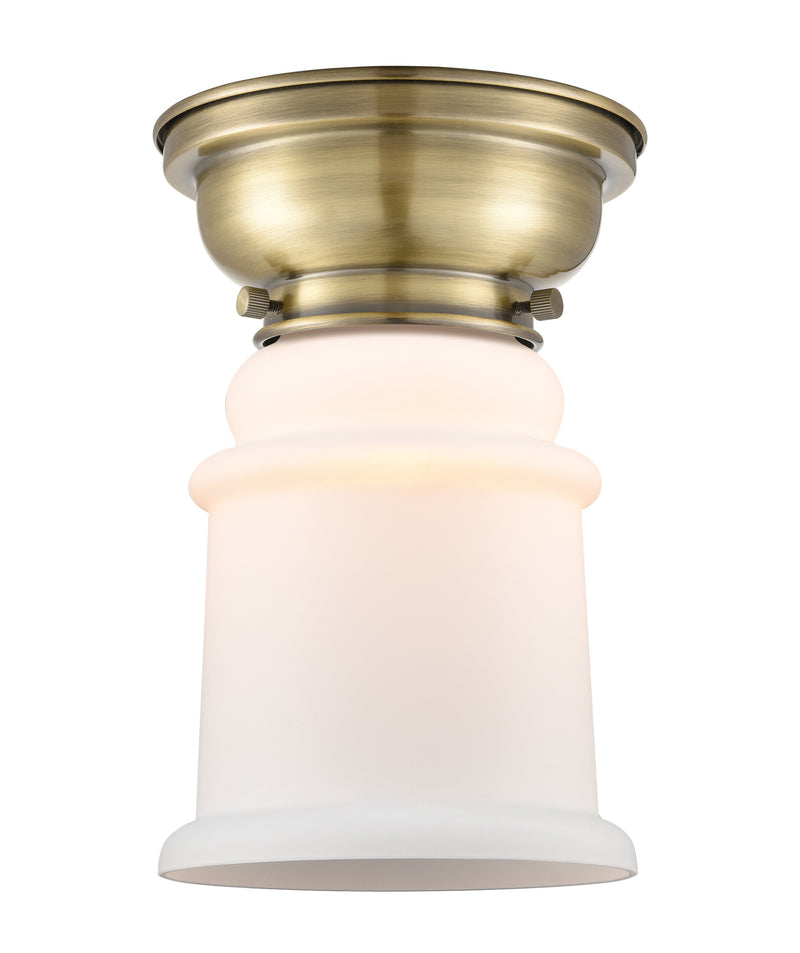 Canton Flush Mount shown in the Antique Brass finish with a Matte White shade