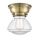 Olean Flush Mount shown in the Antique Brass finish with a Clear shade