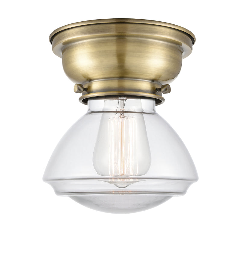 Olean Flush Mount shown in the Antique Brass finish with a Clear shade