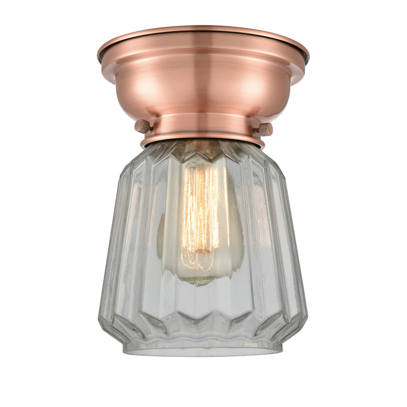 Chatham Flush Mount shown in the Antique Copper finish with a Clear shade