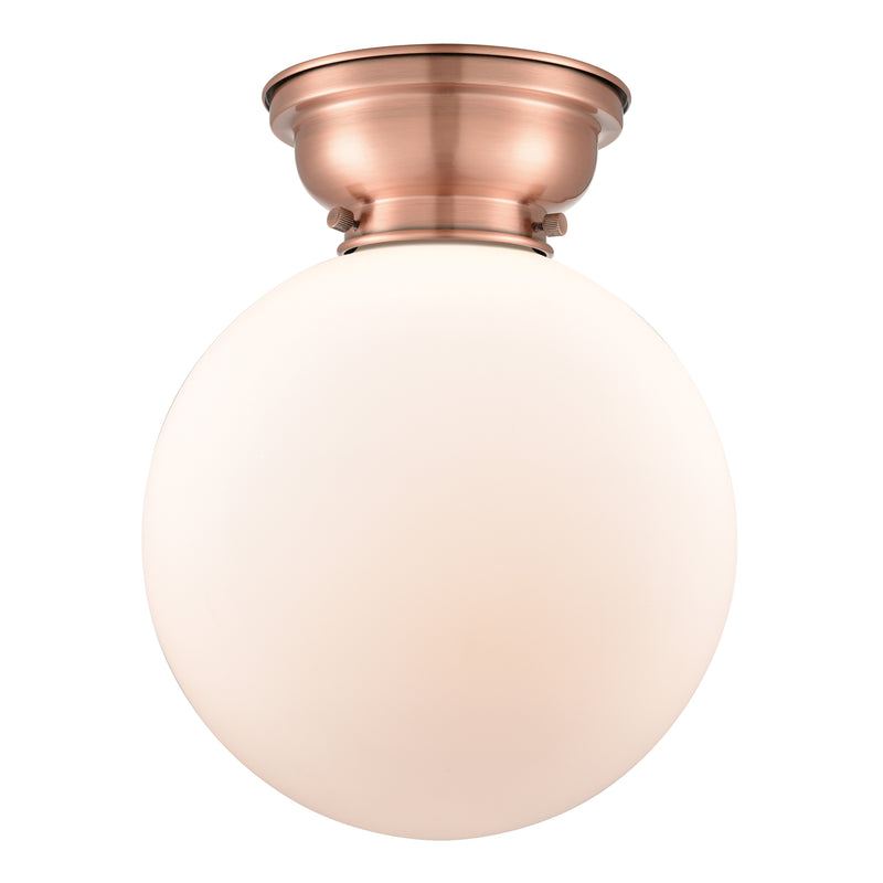 Beacon Flush Mount shown in the Antique Copper finish with a Matte White shade