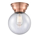 Beacon Flush Mount shown in the Antique Copper finish with a Seedy shade