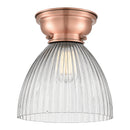 Seneca Falls Flush Mount shown in the Antique Copper finish with a Clear Halophane shade