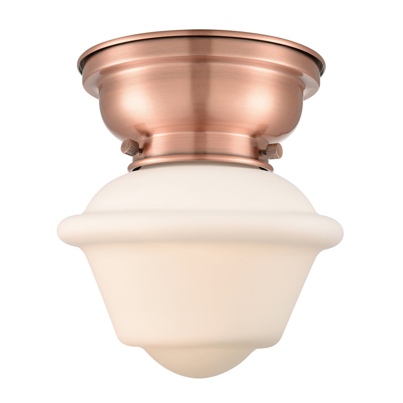 Oxford Flush Mount shown in the Antique Copper finish with a Matte White shade