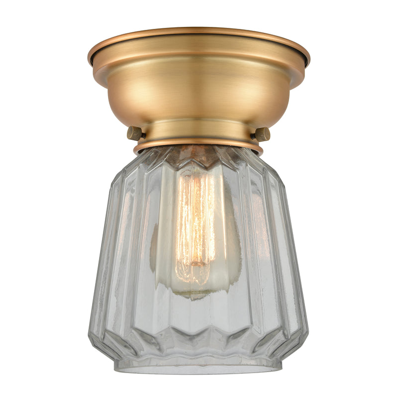 Chatham Flush Mount shown in the Brushed Brass finish with a Clear shade