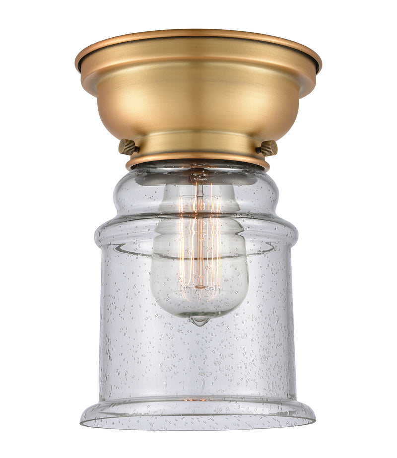 Canton Flush Mount shown in the Brushed Brass finish with a Seedy shade