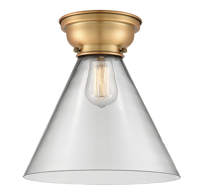 Cone Flush Mount shown in the Brushed Brass finish with a Clear shade