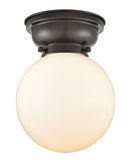 Beacon Flush Mount shown in the Oil Rubbed Bronze finish with a Matte White shade