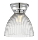 Seneca Falls Flush Mount shown in the Polished Chrome finish with a Clear Halophane shade