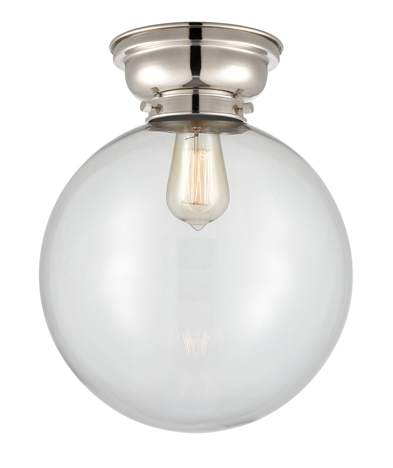 Beacon Flush Mount shown in the Polished Nickel finish with a Clear shade